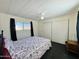 Bright bedroom with double bed, window, and closet at 305 S Val Vista Dr # 204, Mesa, AZ 85204
