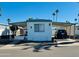 Mobile home exterior with carport and landscaping at 305 S Val Vista Dr # 204, Mesa, AZ 85204
