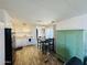 Kitchen with white cabinets, gas stove and dining area at 305 S Val Vista Dr # 204, Mesa, AZ 85204