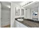 Bathroom with granite countertop and double sinks at 3825 E Camelback Rd # 182, Phoenix, AZ 85018