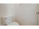 Small half bathroom with toilet and sink at 5659 S 239Th Dr, Buckeye, AZ 85326