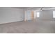 Bright bedroom with neutral walls and carpeting at 5659 S 239Th Dr, Buckeye, AZ 85326