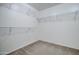 Walk-in closet with wire shelving and hanging rods at 5659 S 239Th Dr, Buckeye, AZ 85326