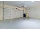 Garage with automatic door opener and extra storage at 5659 S 239Th Dr, Buckeye, AZ 85326