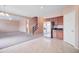 Open kitchen with stainless steel appliances and granite countertops at 5659 S 239Th Dr, Buckeye, AZ 85326