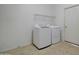 Bright laundry room with washer and dryer at 5659 S 239Th Dr, Buckeye, AZ 85326