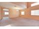 Spacious living room with high ceilings and neutral decor at 5659 S 239Th Dr, Buckeye, AZ 85326