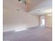 Spacious living room with high ceilings and neutral decor at 5659 S 239Th Dr, Buckeye, AZ 85326