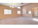 Spacious living room with high ceilings and neutral decor at 5659 S 239Th Dr, Buckeye, AZ 85326
