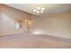 Spacious living room with high ceilings and neutral decor at 5659 S 239Th Dr, Buckeye, AZ 85326