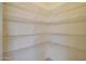 Walk-in pantry with wire shelving for storage at 5659 S 239Th Dr, Buckeye, AZ 85326