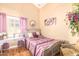 Cozy bedroom with a double bed and hardwood floors at 6722 W Piute Ave, Glendale, AZ 85308