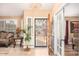 Bright and spacious entryway with tiled floors and French doors at 6722 W Piute Ave, Glendale, AZ 85308