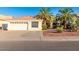 Single-story home with a two-car garage and desert landscaping at 6722 W Piute Ave, Glendale, AZ 85308