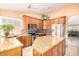 Kitchen with granite countertops and stainless steel appliances at 6722 W Piute Ave, Glendale, AZ 85308
