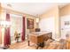 Home office with a large desk and built-in shelving at 6722 W Piute Ave, Glendale, AZ 85308