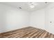 Well-lit bedroom with wood-look floors and ceiling fan at 852 W Palo Verde St, Gilbert, AZ 85233