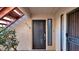 Private condo entrance with modern dark gray door at 9340 N 92Nd St # 118, Scottsdale, AZ 85258