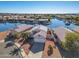 House on the lake with solar panels and a two-car garage at 11021 W Tonto Ln, Peoria, AZ 85373