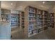 Spacious library with well-organized bookshelves at 11021 W Tonto Ln, Peoria, AZ 85373