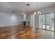 Living room with hardwood floors, fireplace and sliding doors to patio at 11021 W Tonto Ln, Peoria, AZ 85373