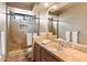 Clean bathroom with tile shower and updated vanity at 11410 E Juan Tabo Rd, Scottsdale, AZ 85255