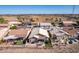 Aerial view of houses and surrounding area at 11553 W Sonoran Ct, Surprise, AZ 85378