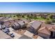 Aerial view of houses near a golf course at 11553 W Sonoran Ct, Surprise, AZ 85378