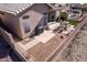 Backyard with patio, grill, and artificial turf at 11553 W Sonoran Ct, Surprise, AZ 85378