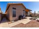 Backyard with patio, grill, and gravel landscaping at 11553 W Sonoran Ct, Surprise, AZ 85378