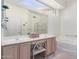 Bathroom features double sinks, a soaking tub and shower at 11553 W Sonoran Ct, Surprise, AZ 85378