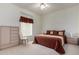 Spacious bedroom with a king-size bed and ample closet space at 11553 W Sonoran Ct, Surprise, AZ 85378
