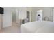 Bedroom with a queen-size bed and ensuite bathroom at 11553 W Sonoran Ct, Surprise, AZ 85378