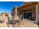 Covered patio perfect for outdoor dining and entertaining at 11553 W Sonoran Ct, Surprise, AZ 85378