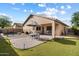 Large backyard with patio, pool, and seating area at 21995 N 76Th Ln, Peoria, AZ 85383