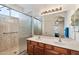 Double vanity bathroom with a large shower and mirror at 21995 N 76Th Ln, Peoria, AZ 85383