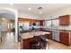 Kitchen with granite countertops, stainless steel appliances, and an island at 21995 N 76Th Ln, Peoria, AZ 85383