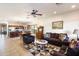 Spacious living room featuring a cozy seating area and open floor plan at 21995 N 76Th Ln, Peoria, AZ 85383