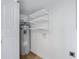 Small laundry room with shelving and water heater at 2415 N 71St St # D, Scottsdale, AZ 85257