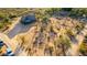 Aerial view of a home with a fenced yard and desert landscape at 27852 N 79Th St, Scottsdale, AZ 85266