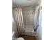 Bathroom with shower/tub combo and neutral tile at 4065 E University Dr # 373, Mesa, AZ 85205