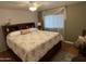 Large bedroom with king-size bed and ample closet space at 4065 E University Dr # 373, Mesa, AZ 85205