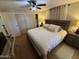 Spacious main bedroom with a large bed and plenty of closet space at 4065 E University Dr # 373, Mesa, AZ 85205