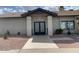Inviting building exterior with double doors and landscaping at 4065 E University Dr # 373, Mesa, AZ 85205
