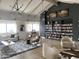 Community room with a large bookcase and comfortable seating at 4065 E University Dr # 373, Mesa, AZ 85205