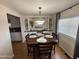 Bright dining area with built-in hutch and wood table at 4065 E University Dr # 373, Mesa, AZ 85205