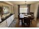 Bright dining room with built-in cabinetry and wood flooring at 4065 E University Dr # 373, Mesa, AZ 85205
