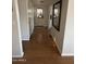 Bright entry hall with wood-look flooring and access to other rooms at 4065 E University Dr # 373, Mesa, AZ 85205