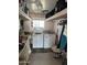 Laundry room with washer, dryer, and overhead shelving at 4065 E University Dr # 373, Mesa, AZ 85205