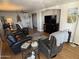 Spacious living room with comfortable seating and a large TV at 4065 E University Dr # 373, Mesa, AZ 85205